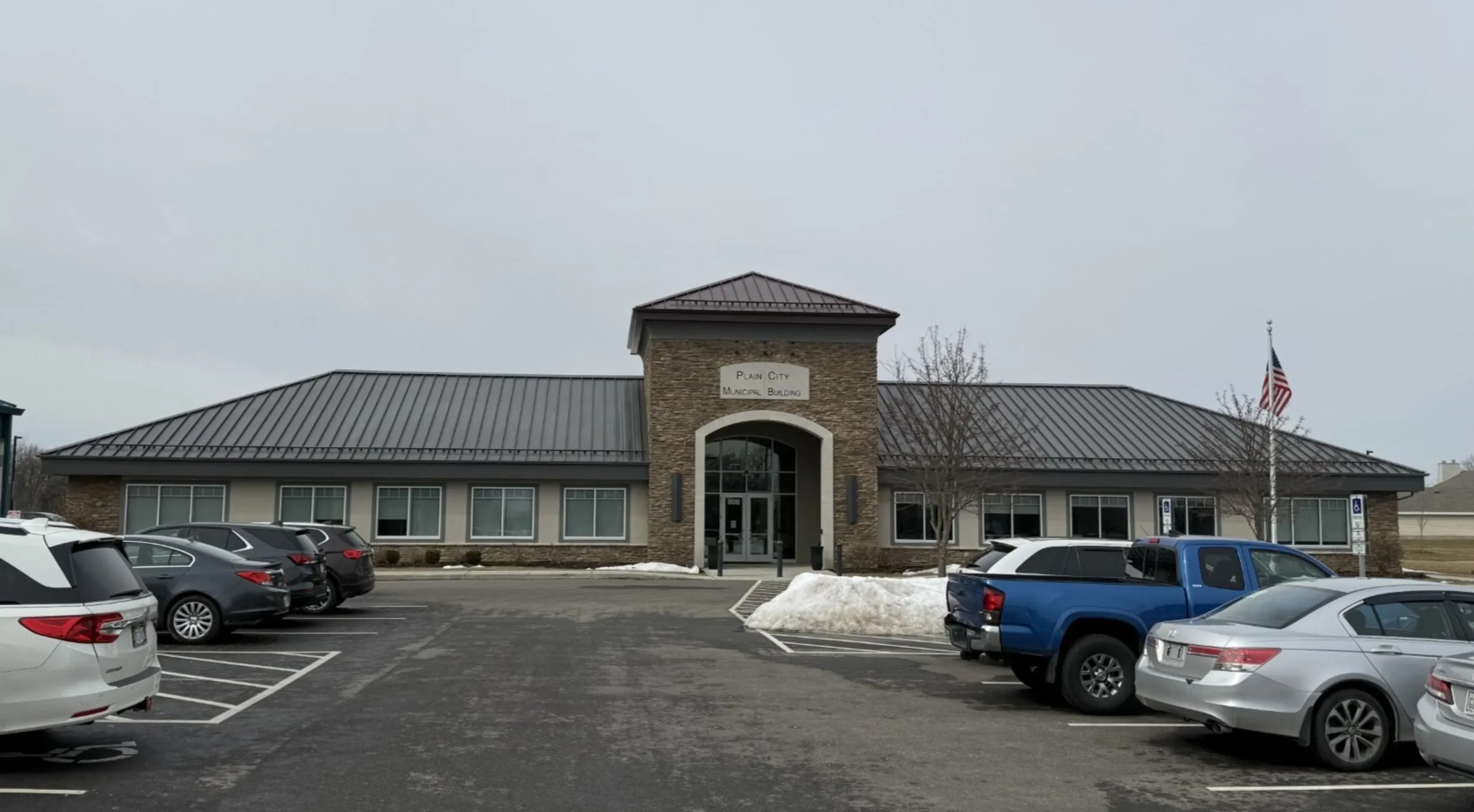 Plain City building and community visit